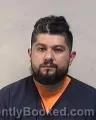 Mugshot of ROLANDO JAVIER IGLESIAS booked in Kenosha County, Wisconsin on May 2, 2026
