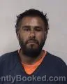Mugshot of Juan Carlos Romero booked in Kenosha County, Wisconsin on July 31, 2026