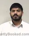 Mugshot of Umair Iqbal booked in Kenosha County, Wisconsin on August 4, 2026