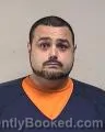 Mugshot of Cory Mitchel Baez booked in Kenosha County, Wisconsin on August 14, 2026
