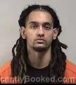 Mugshot of Domonic-Jacob Deleon Cooper booked in Kenosha County, Wisconsin on August 19, 2026