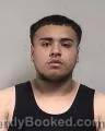 Mugshot of Marcos Junior Junior Cruz booked in Kenosha County, Wisconsin on September 27, 2026