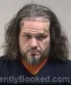 Mugshot of Giovanni Edward Capps booked in Kenosha County, Wisconsin on October 4, 2026