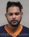 Mugshot of Carlos Eduardo Reyes-Santiago booked in Kenosha County, Wisconsin on October 25, 2026