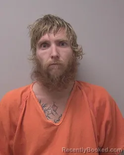 Mugshot of JUSTIN MICHAEL NOVEMBRE