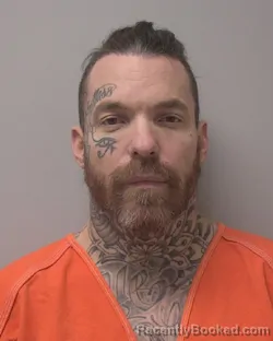 Mugshot of JOSHUA W WOODS