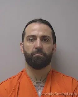 Mugshot of TREG RICHARD LEDER booked in Marathon County, Wisconsin on June 10, 2026