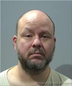 Mugshot of Aaron Beuscher booked in Milwaukee County, Wisconsin on March 11, 2026