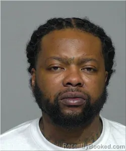 Mugshot of Justin Moore booked in Milwaukee County, Wisconsin on March 21, 2026