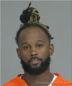 Mugshot of Johnny Holmes booked in Milwaukee County, Wisconsin on July 28, 2026