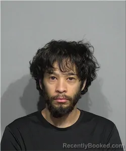 Mugshot of Juan Enrique booked in Milwaukee County, Wisconsin on July 30, 2026