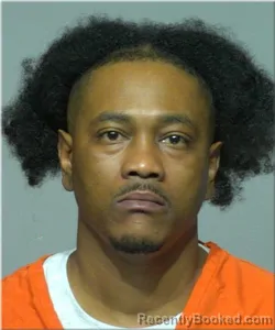 Mugshot of Michol Thomas booked in Milwaukee County, Wisconsin on August 4, 2026