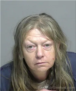 Mugshot of Kristy Aschenbrenner booked in Milwaukee County, Wisconsin on August 12, 2026