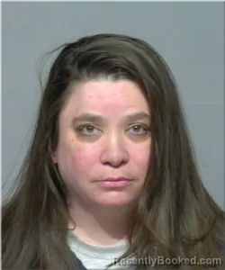Mugshot of Carrie Schmidt booked in Milwaukee County, Wisconsin on August 14, 2026