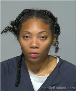 Mugshot of Asia Woods booked in Milwaukee County, Wisconsin on August 19, 2026