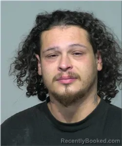 Mugshot of Julian Rosario booked in Milwaukee County, Wisconsin on August 22, 2026
