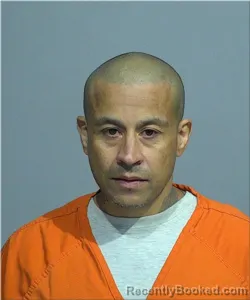 Mugshot of Carlos Santiago-Morales booked in Milwaukee County, Wisconsin on October 14, 2026