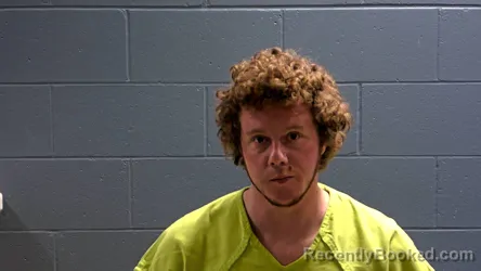 Mugshot of Tyler Chirstopher Knaack booked in Oconto County, Wisconsin on April 4, 2026