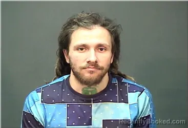 Mugshot of Nicolaus Harvot booked in Ozaukee County, Wisconsin on March 28, 2026