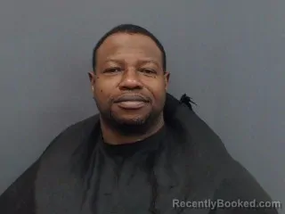 Mugshot of PETER LINDSAY HOLLINS