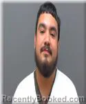 Mugshot of Juan Deluna booked in Racine County, Wisconsin on June 23, 2026