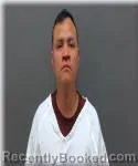 Mugshot of Adrian Tapia Gonzalez booked in Racine County, Wisconsin on June 25, 2026