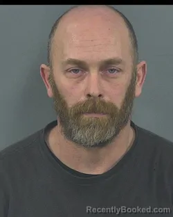 Mugshot of JUSTIN SCOTT SCHEUERMANN booked in Sawyer County, Wisconsin on March 21, 2026