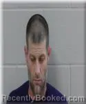 Mugshot of Clinton Lemek