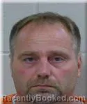 Mugshot of Kris Schank booked in Trempealeau County, Wisconsin on July 9, 2026