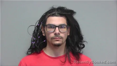Mugshot of Michal Guzman booked in Walworth County, Wisconsin on May 14, 2026