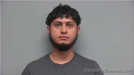 Mugshot of Carlos Amador Herrera booked in Walworth County, Wisconsin on July 17, 2026