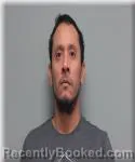 Mugshot of Santos Arauz Osegueda booked in Walworth County, Wisconsin on October 22, 2026