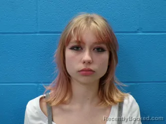 Mugshot of GENAVIE DISHNER