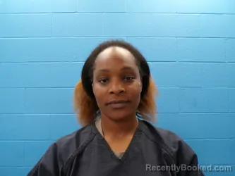 Mugshot of QIANI JANINE BENJAMIN booked in Guadalupe County, Texas on April 14, 2026