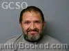 Mugshot of Alden John Hill booked in Goshen County, Wyoming on October 21, 2026
