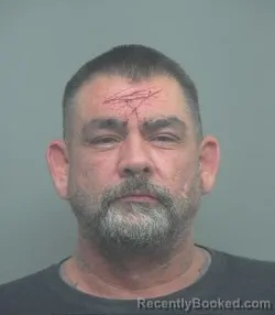 Mugshot of JUSTIN REW WILEY