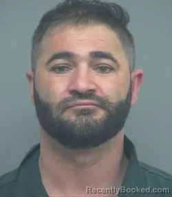 Mugshot of CHRISTIAN IAMANDITA booked in Sweetwater County, Wyoming on April 3, 2026