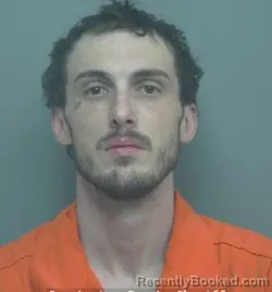 Mugshot of CHRISTIAN SCOTT OUEILHE booked in Sweetwater County, Wyoming on May 20, 2026