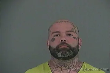 Mugshot of Justin Owen Roe booked in Anderson County, Tennessee on September 27, 2026