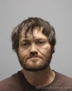 Mugshot of JUSTIN BRUMLEY
