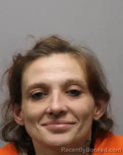 Mugshot of KRISTIE APRIL LYNN HOWARD REVELLE booked in Bradley County, Tennessee on April 7, 2026