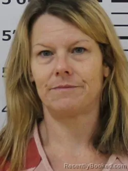 Mugshot of MICHELLE R HUGHES