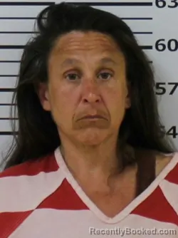 Mugshot of JENNIFER MICHELLE RUSSELL MILLER