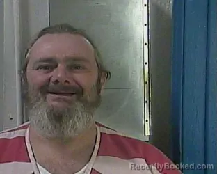 Mugshot of MICHAEL JAMES REAGON