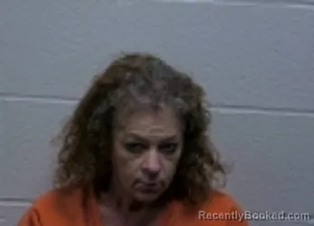 Mugshot of JENNIFER KELLI LOVE booked in Giles County, Tennessee on May 14, 2026