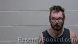 Mugshot of Brandon Clay Moss booked in Giles County, Tennessee on October 23, 2026