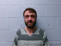 Mugshot of JUSTIN LEE COFFEY