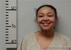 Mugshot of Trinity Anne Belcarris booked in Hardin County, Texas on August 26, 2026