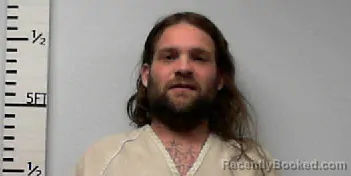 Mugshot of Travis Paul Enmon booked in Hardin County, Texas on May 7, 2026