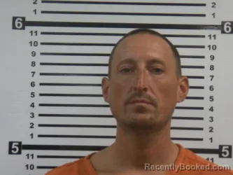 Mugshot of Adam Michael Hartel booked in Hardeman County, Tennessee on August 24, 2026